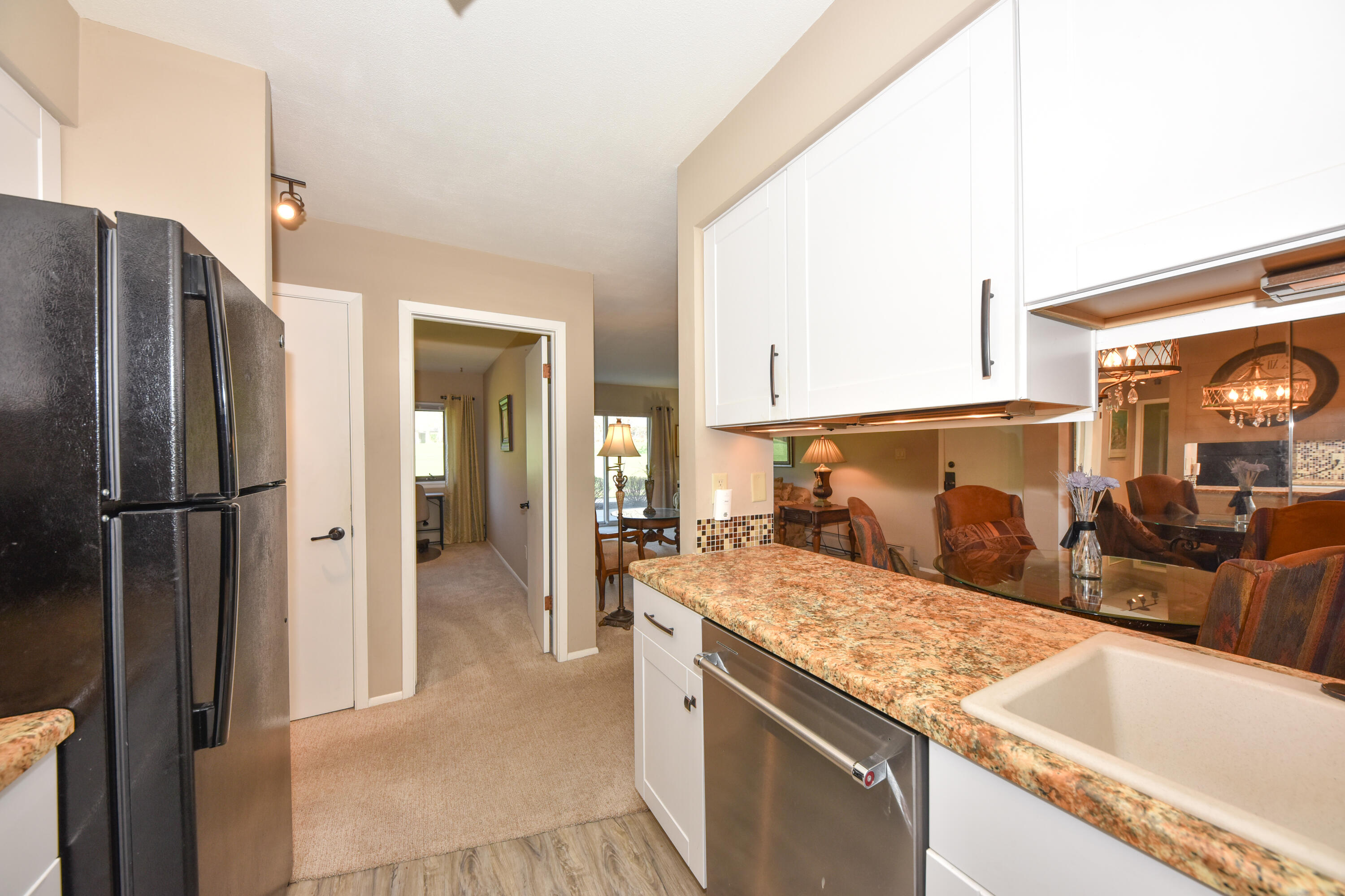 3935 South 84th Street, Unit 4 Greenfield, WI 53228 - Photo 5 of 24 Kitchen open to Dining Area