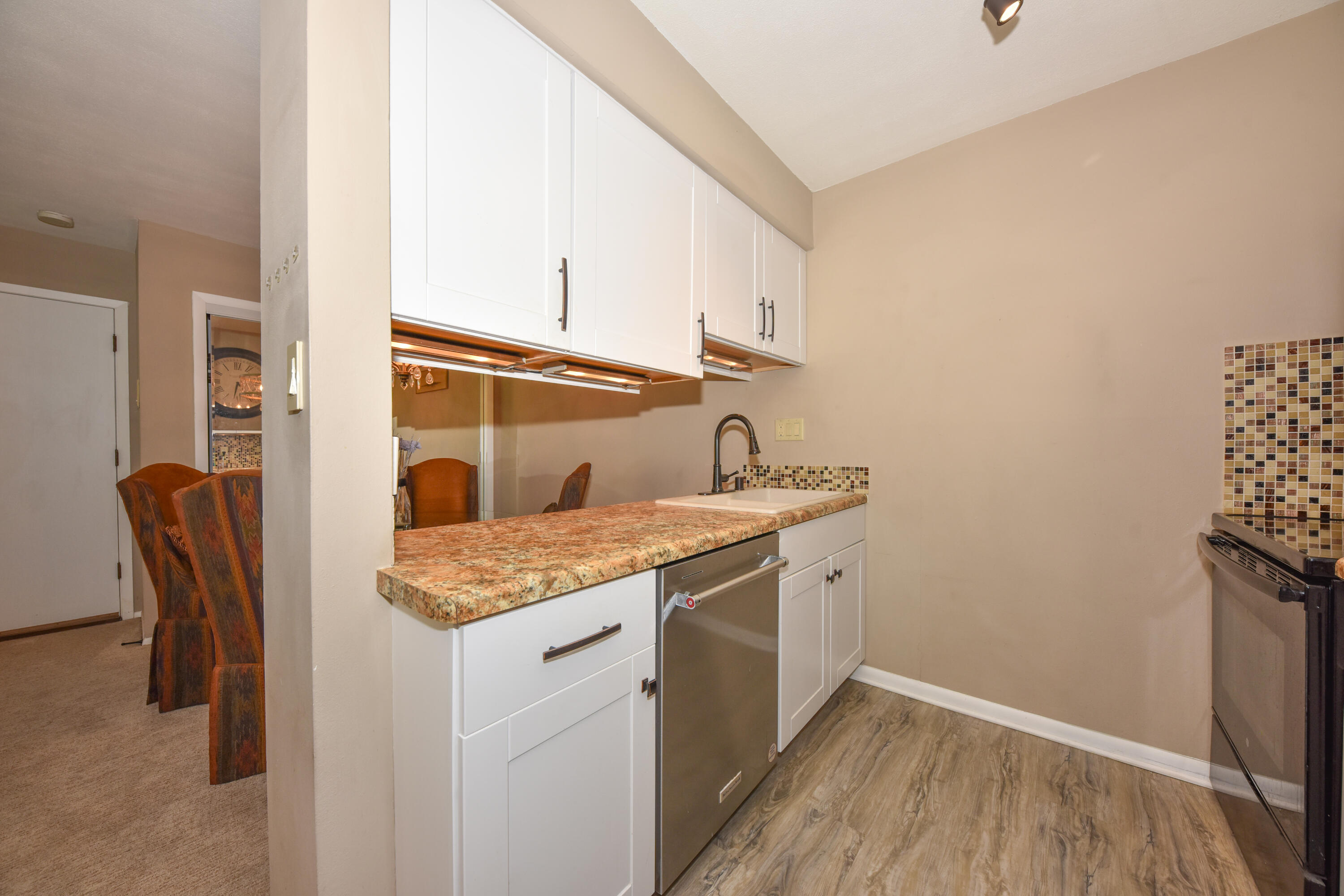 3935 South 84th Street, Unit 4 Greenfield, WI 53228 - Photo 6 of 24 Updated Kitchen Cabinets and fixtures