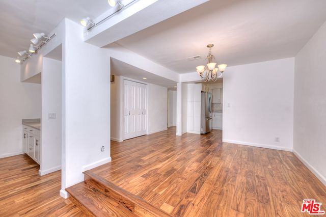 a view of a chandelier in a room
