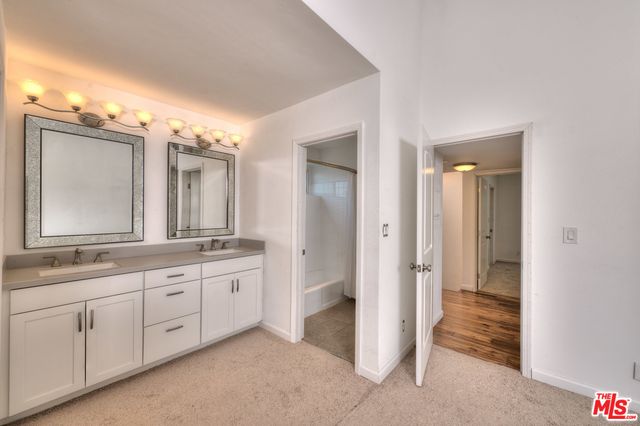 a view of a room with a fan