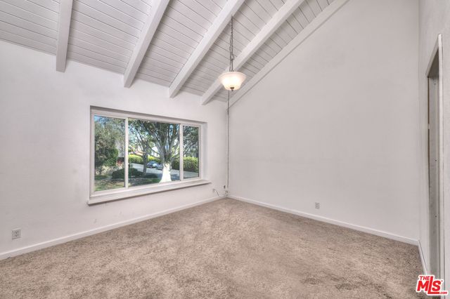 a view of a room with an empty space