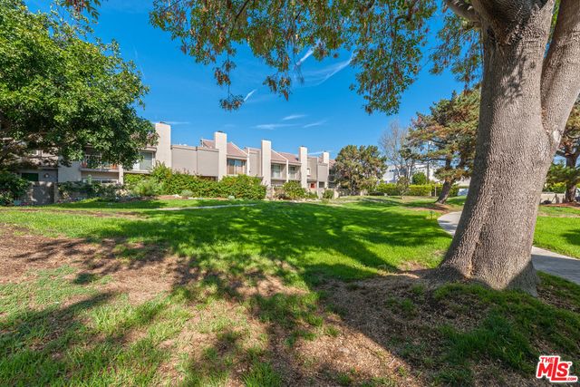 a view of a house with a big yard
