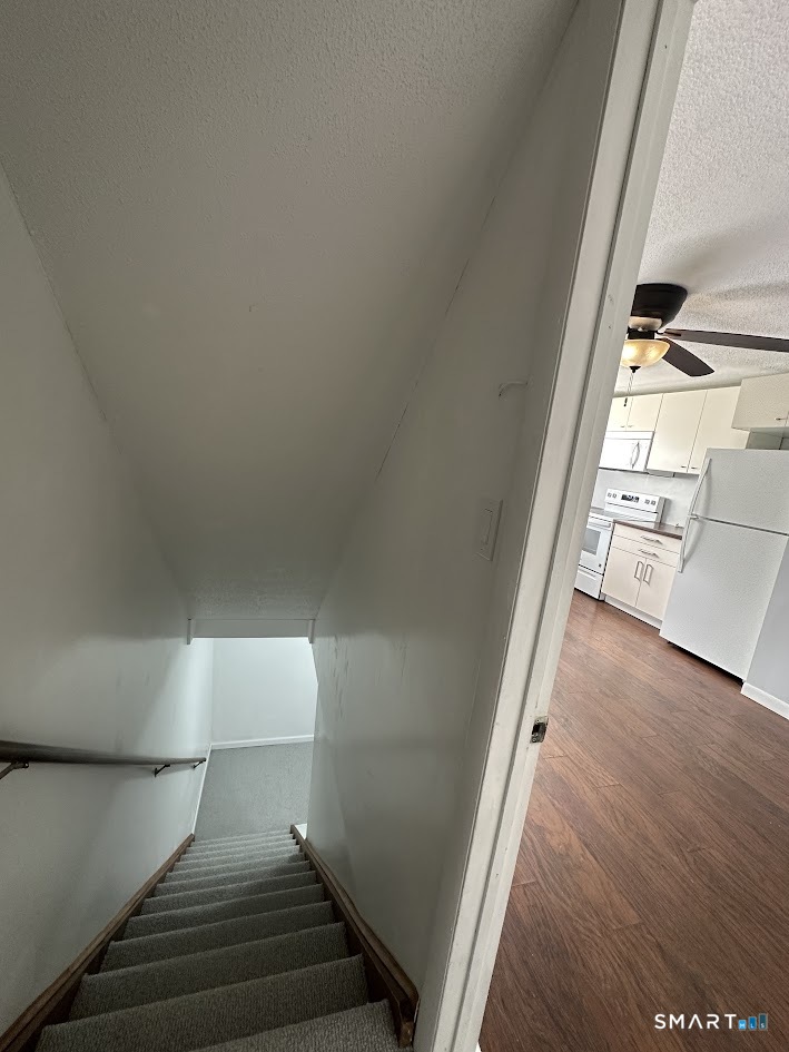 39 Horton Hill Road, Unit 7C Naugatuck, CT 06770 - Photo 16 of 29 a view of entryway and hall with wooden floor