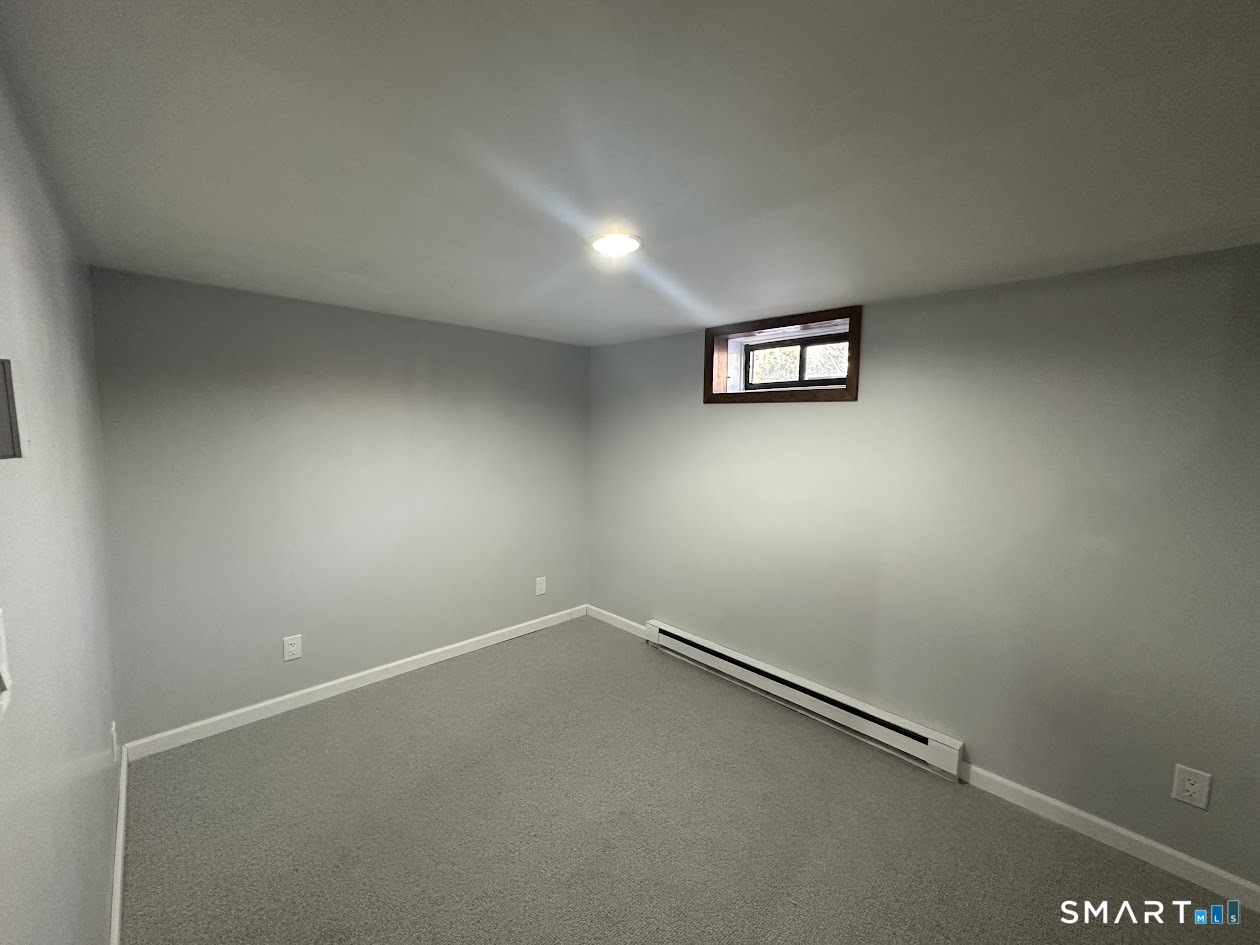 39 Horton Hill Road, Unit 7C Naugatuck, CT 06770 - Photo 21 of 29 an empty room with a window