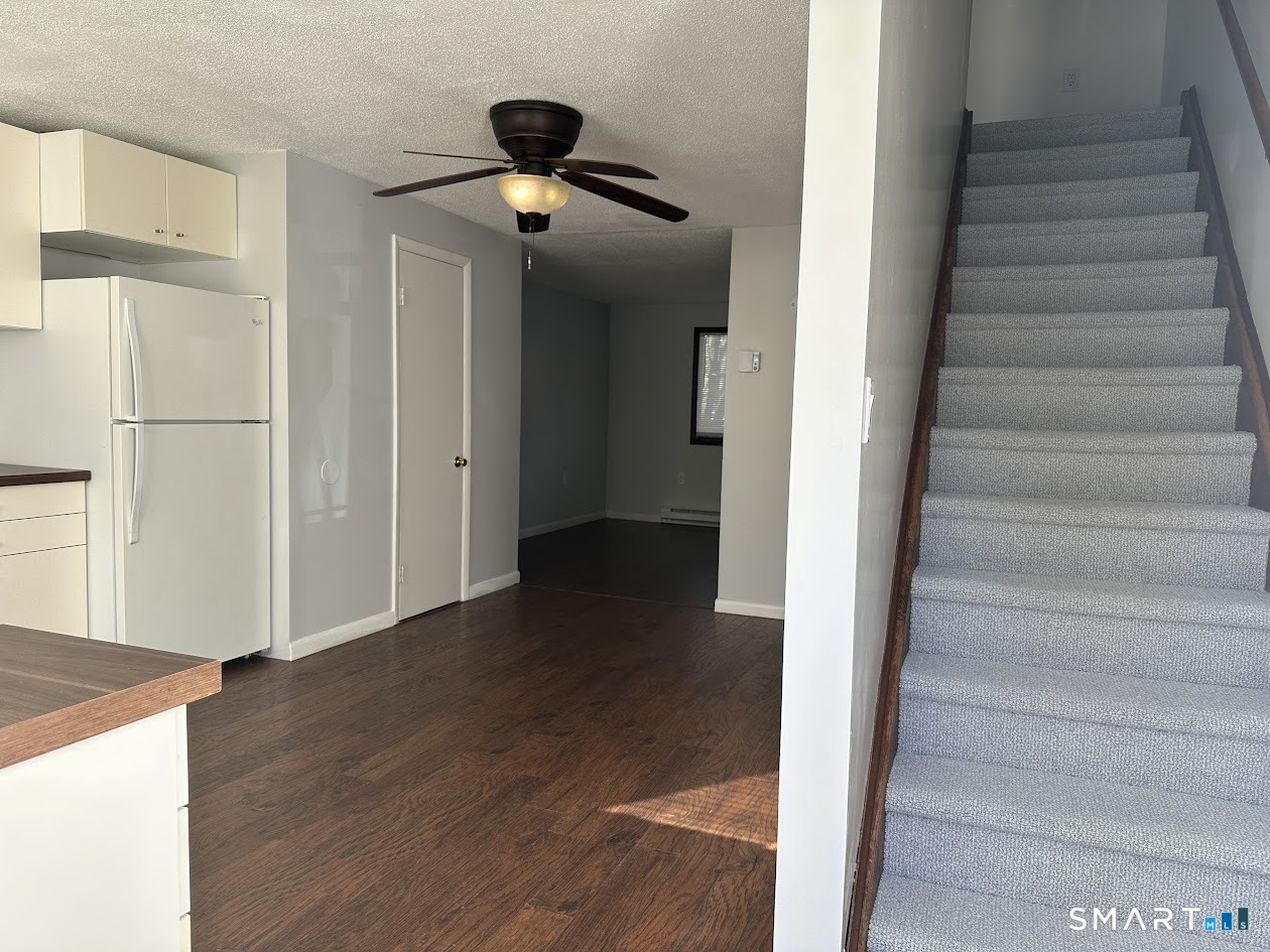 39 Horton Hill Road, Unit 7C Naugatuck, CT 06770 - Photo 24 of 29 a view of an entryway with wooden floor