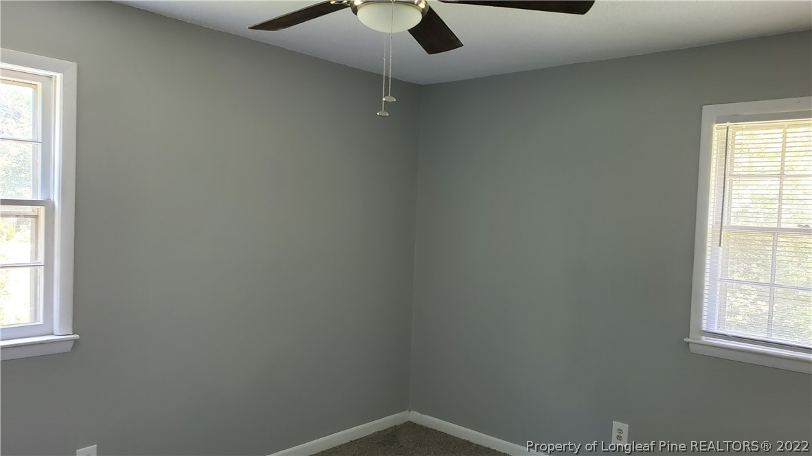 39 Gladiola Drive Spring Lake, NC 28390 - Photo 3 of 8 an empty room with a window