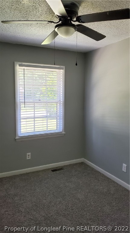 39 Gladiola Drive Spring Lake, NC 28390 - Photo 5 of 8 a view of an empty room with a window