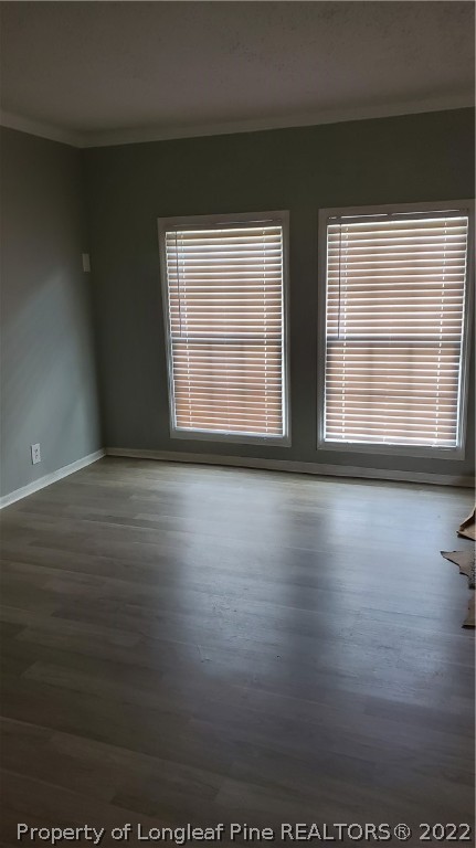 39 Gladiola Drive Spring Lake, NC 28390 - Photo 7 of 8 a view of wooden floor and windows in a room