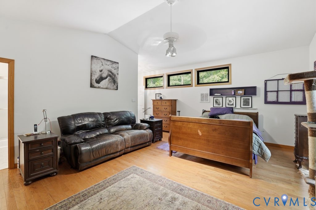 1061 Turkey Ridge Drive Moseley, VA 23120 - Photo 26 of 51 a living room with furniture and painting on the wall