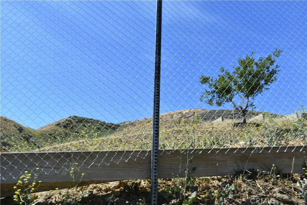 0 San Martinez Road Val Verde, CA 91384 - Photo 8 of 9 a view of a wooden floor with a lake view