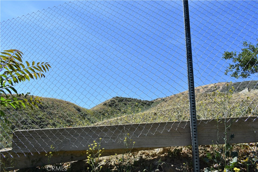 0 San Martinez Road Val Verde, CA 91384 - Photo 9 of 9 a view of a wooden door and a yard