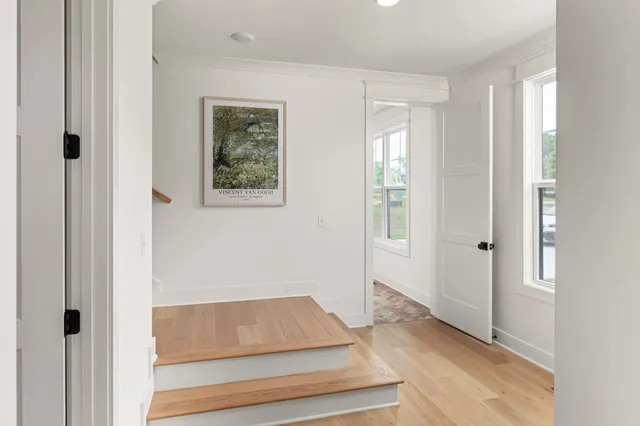 a room with window and a ceiling fan