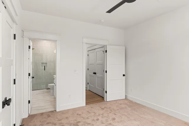 a view of a bathroom with a shower and a sink