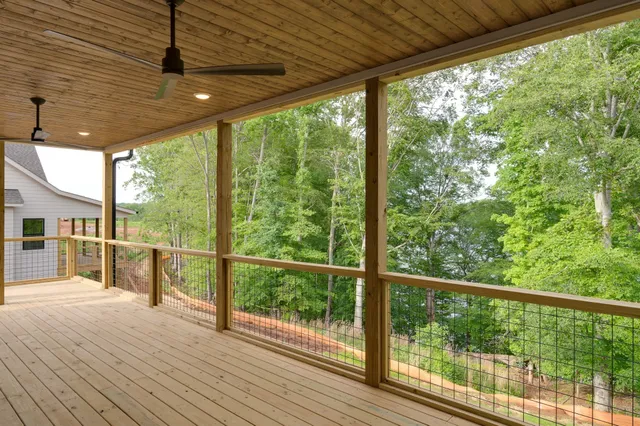 a view of outdoor space with wooden floor