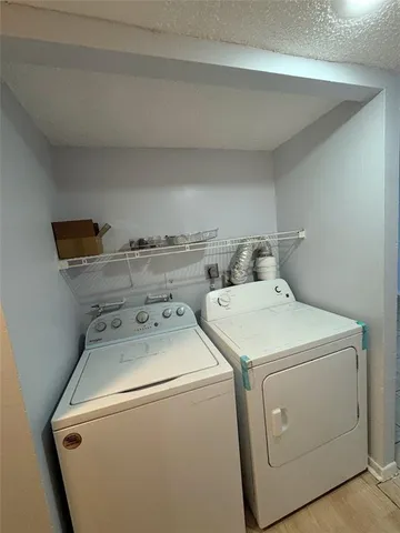 a view of a livingroom with a furniture