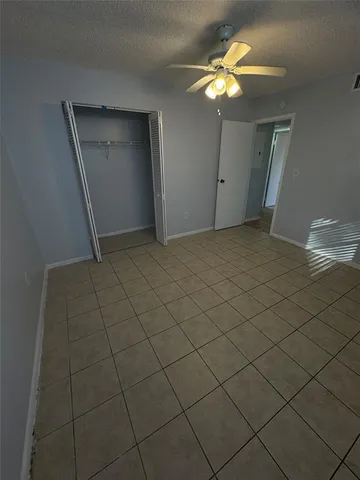 a view of hallway with closet
