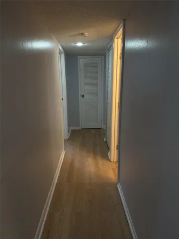 a bathroom with a sink toilet and a mirror