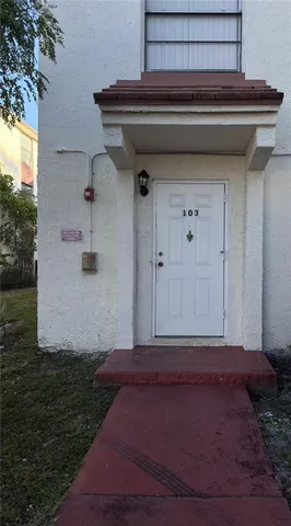 a view of a livingroom with an empty space and a sink