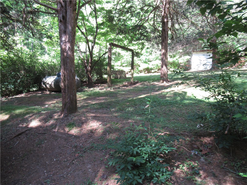 437 West Gate Road Pickens, SC 29671 - Photo 33 of 47 This tranquil yard features mature trees and a natural setting for peaceful outdoor enjoyment.