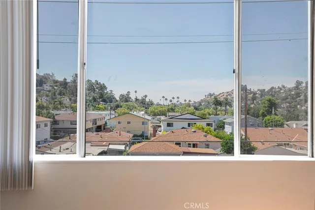 a view of a balcony with couches