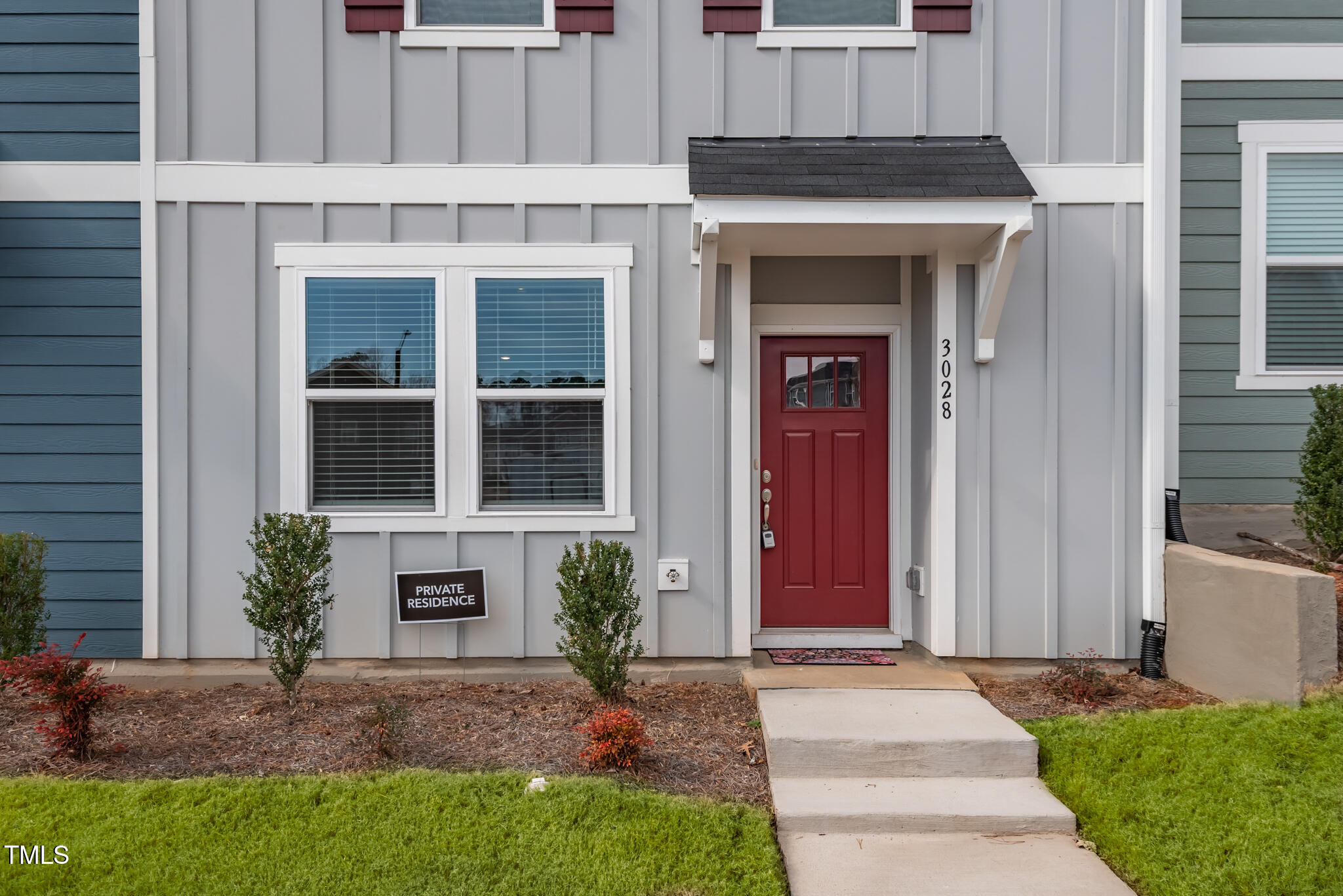 3028 Spline Circle Raleigh, NC 27610 - Photo 1 of 27 a front view of a house with a yard and garage