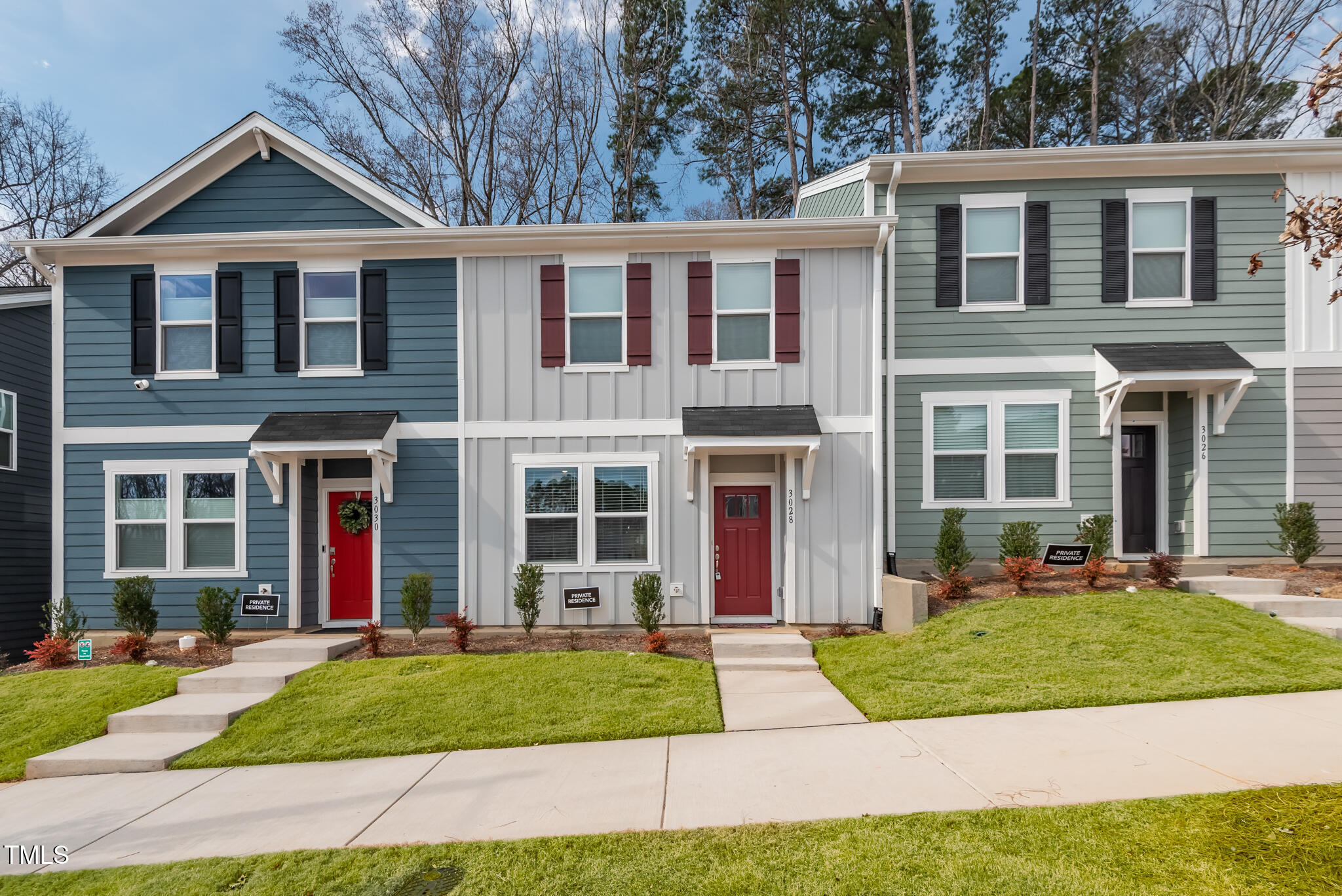 3028 Spline Circle Raleigh, NC 27610 - Photo 2 of 27 a front view of a house with a yard