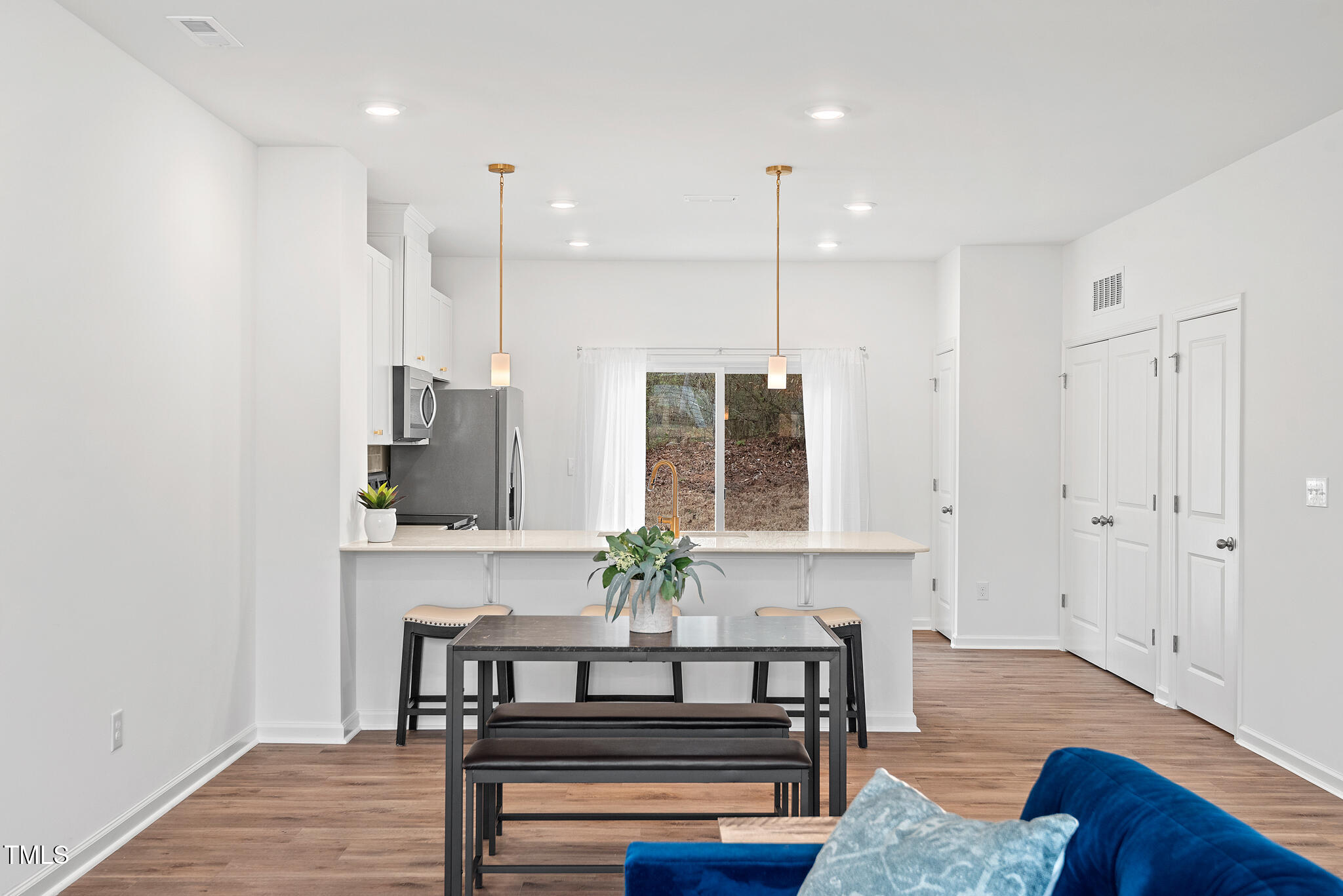 3028 Spline Circle Raleigh, NC 27610 - Photo 3 of 27 a view of a livingroom with furniture and wooden floor