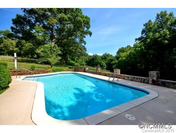 220 Blockhouse Road Landrum, SC 29356 - Photo 14 of 17 a view of a swimming pool with a yard
