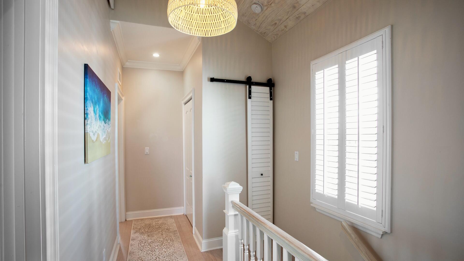 1327 Whitehead Street Key West, FL 33040 - Photo 20 of 37 a view of entryway with a window and chandelier