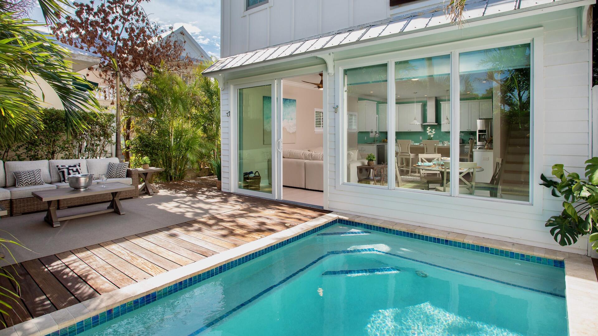 1327 Whitehead Street Key West, FL 33040 - Photo 2 of 37 a view of a backyard with a patio