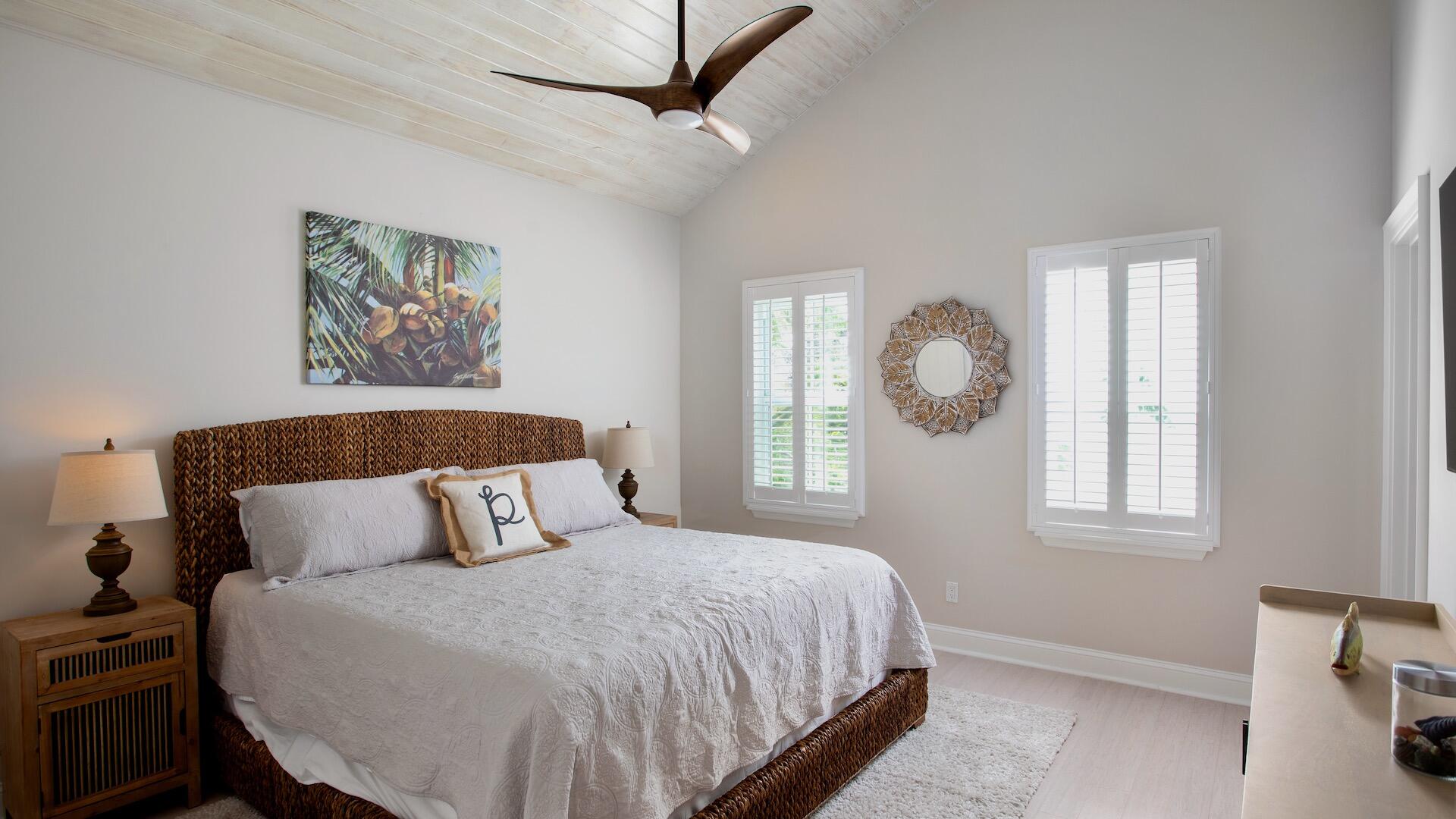 1327 Whitehead Street Key West, FL 33040 - Photo 22 of 37 a bedroom with a bed and a window