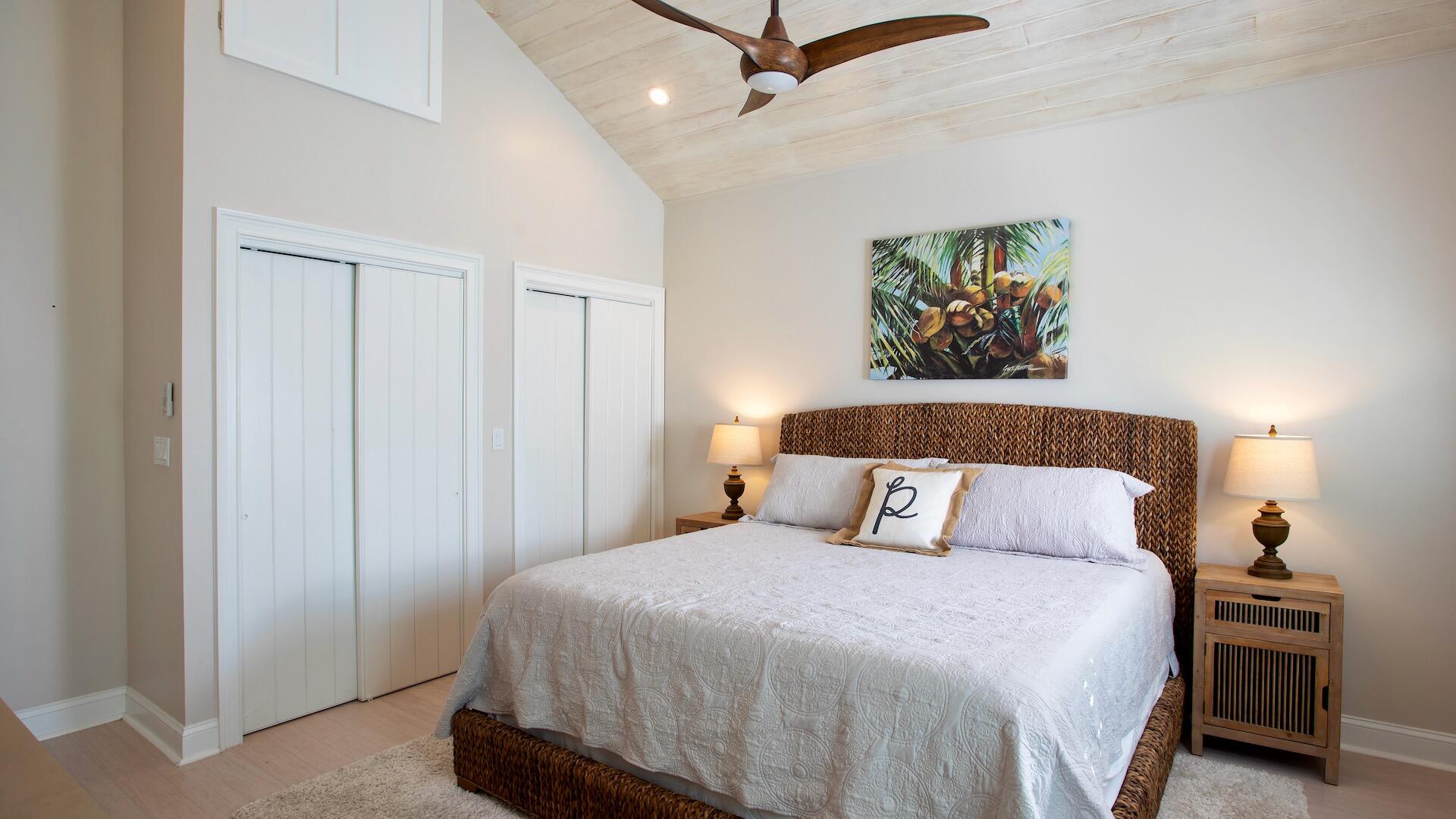 1327 Whitehead Street Key West, FL 33040 - Photo 23 of 37 a bedroom with a bed and a painting on the wall