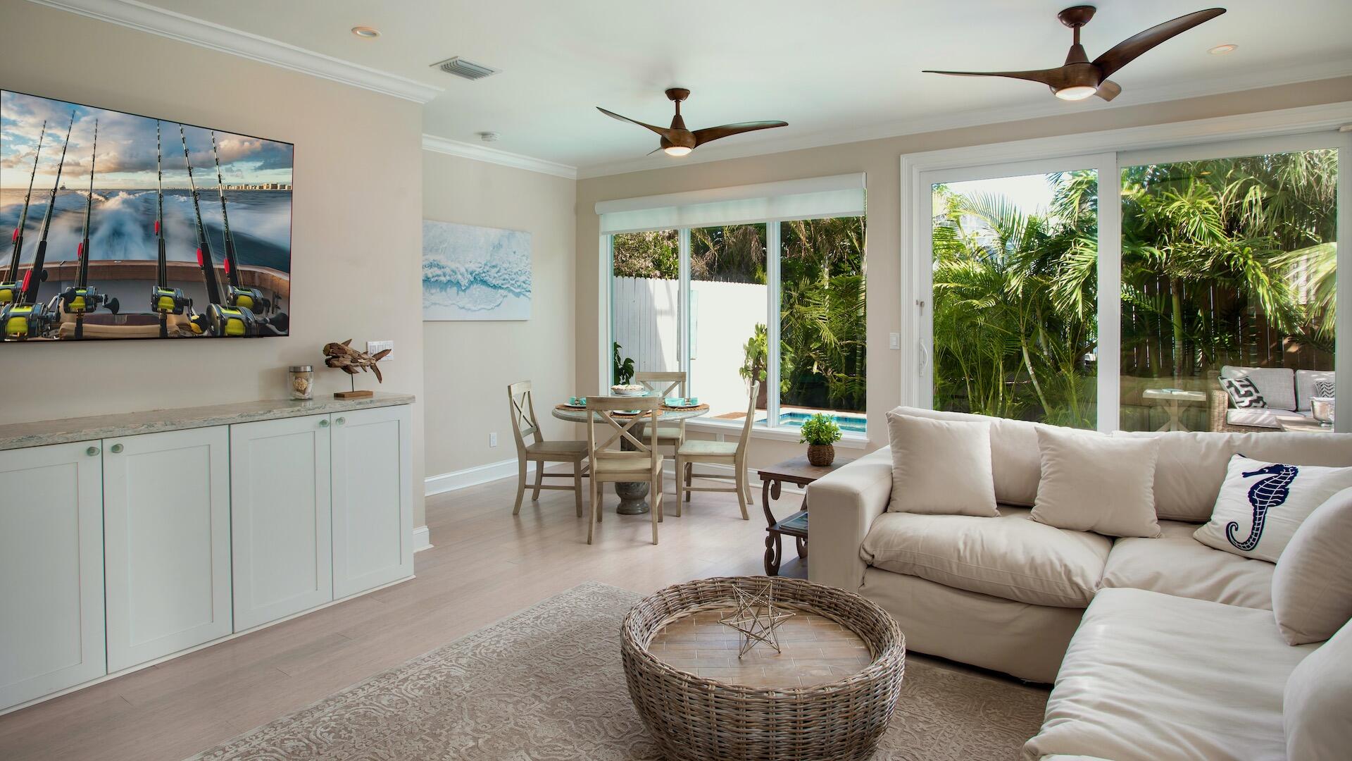 1327 Whitehead Street Key West, FL 33040 - Photo 3 of 37 a living room with furniture and a large window