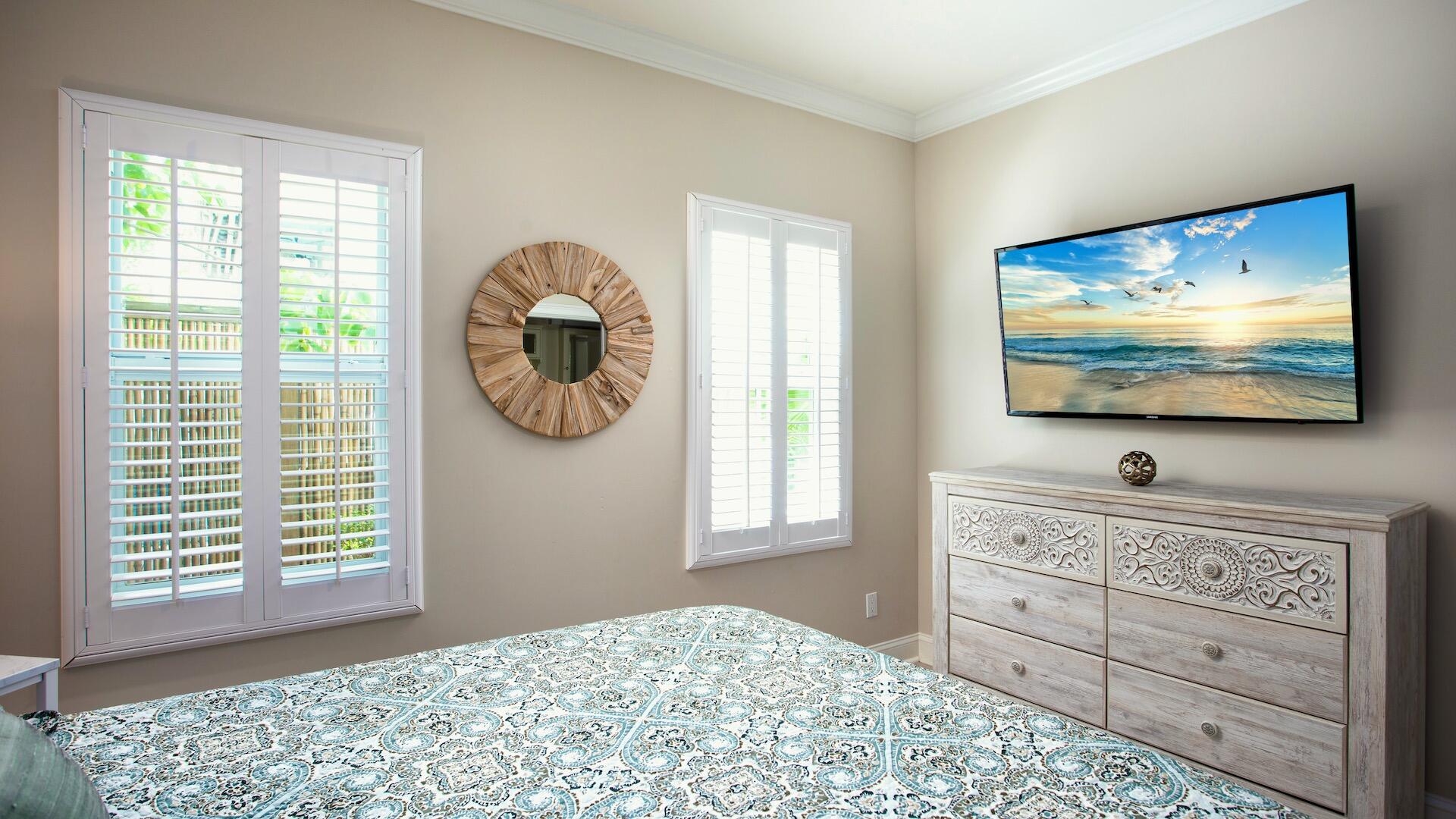 1327 Whitehead Street Key West, FL 33040 - Photo 33 of 37 a living room with window and a flat screen tv