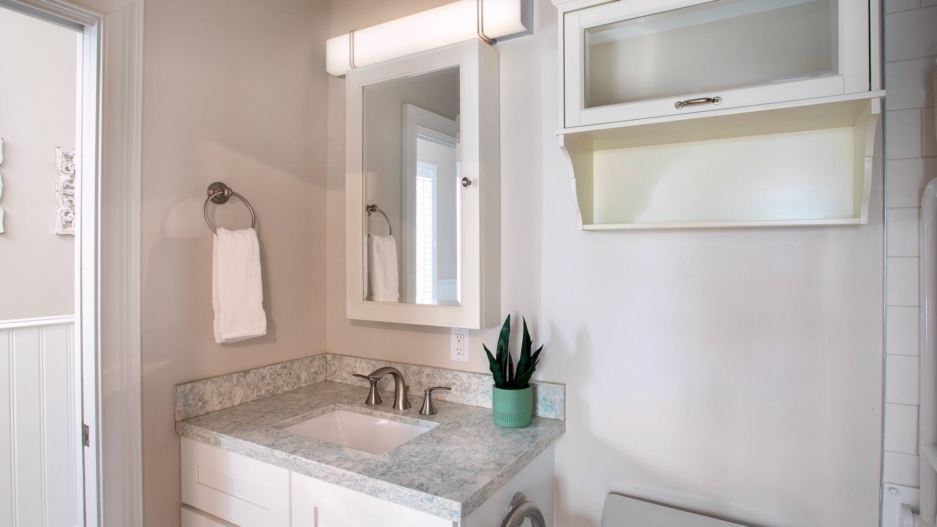 1327 Whitehead Street Key West, FL 33040 - Photo 36 of 37 a bathroom with a granite countertop sink and a mirror