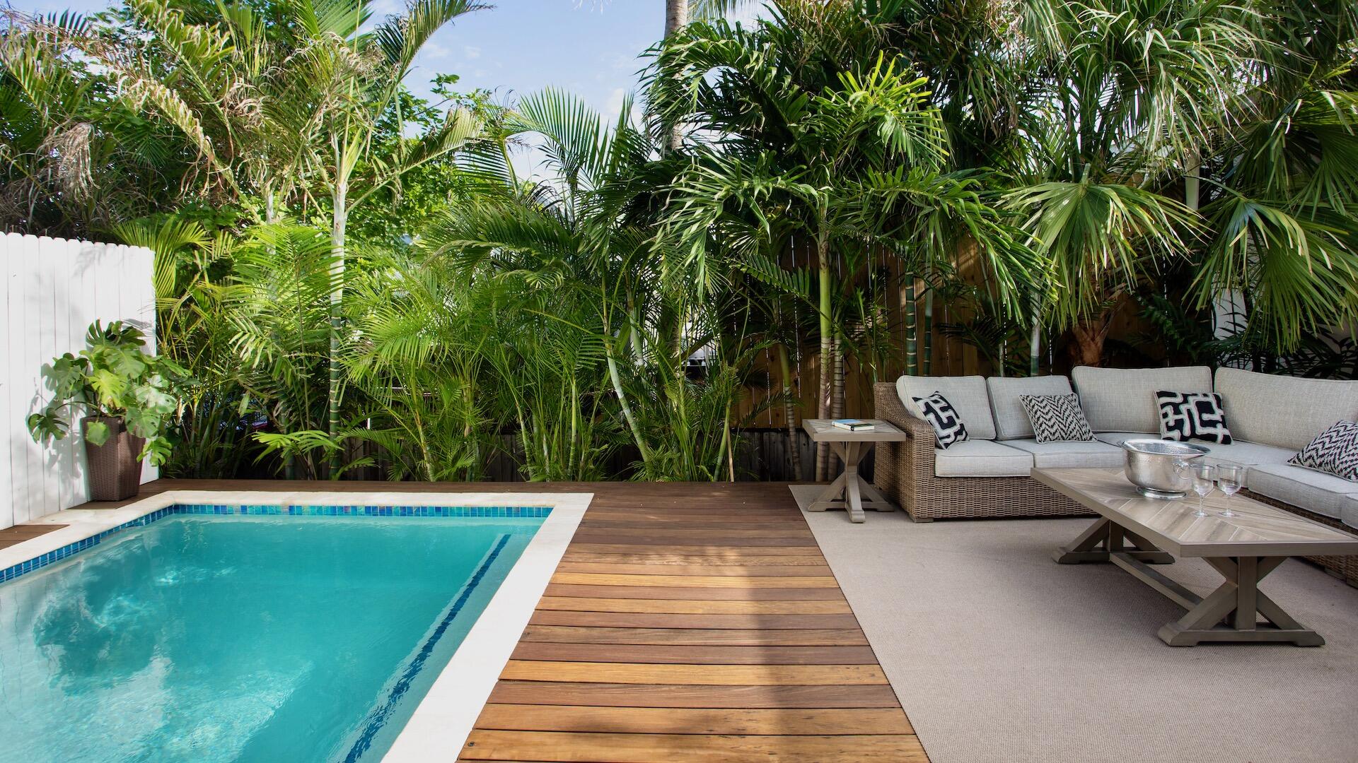 1327 Whitehead Street Key West, FL 33040 - Photo 8 of 37 a view of swimming pool with seating area and garden