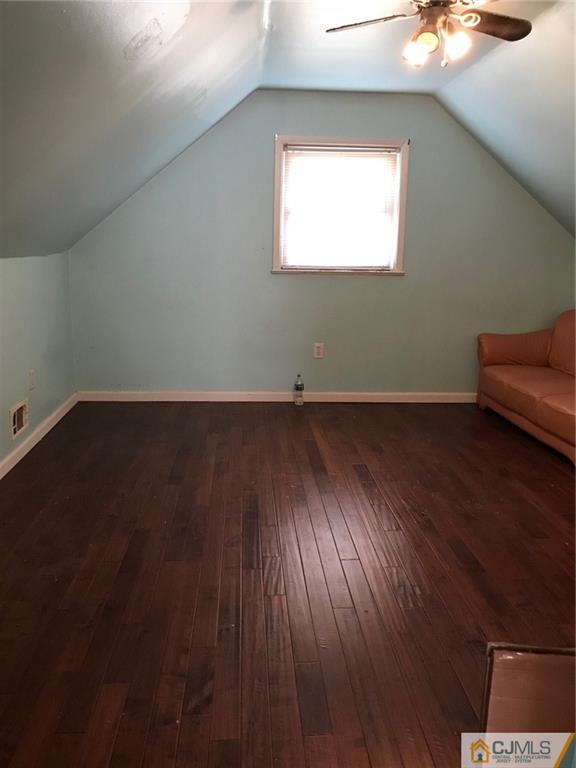 21 Kendall Road East Brunswick, NJ 08816 - Photo 13 of 21 an empty room with wooden floor and windows