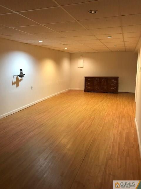 21 Kendall Road East Brunswick, NJ 08816 - Photo 16 of 21 an empty room with wooden floor and windows