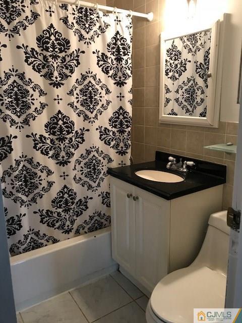 21 Kendall Road East Brunswick, NJ 08816 - Photo 18 of 21 a bathroom with a sink toilet and shower