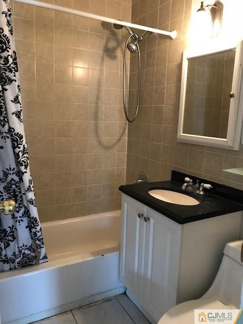 21 Kendall Road East Brunswick, NJ 08816 - Photo 19 of 21 a bathroom with a sink and a bathtub