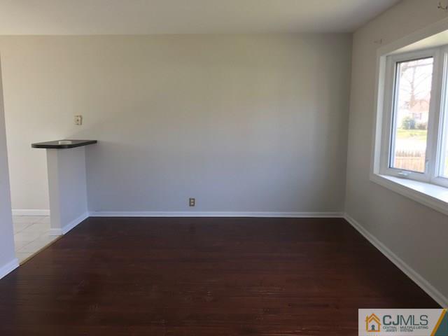 21 Kendall Road East Brunswick, NJ 08816 - Photo 3 of 21 an empty room with a window