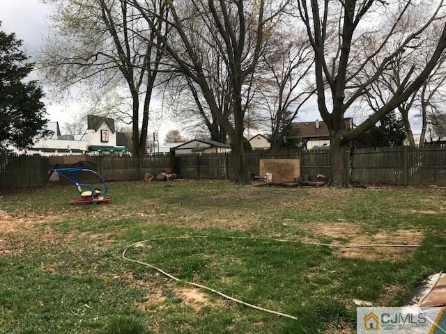 21 Kendall Road East Brunswick, NJ 08816 - Photo 21 of 21 a backyard of a house with lots of green space