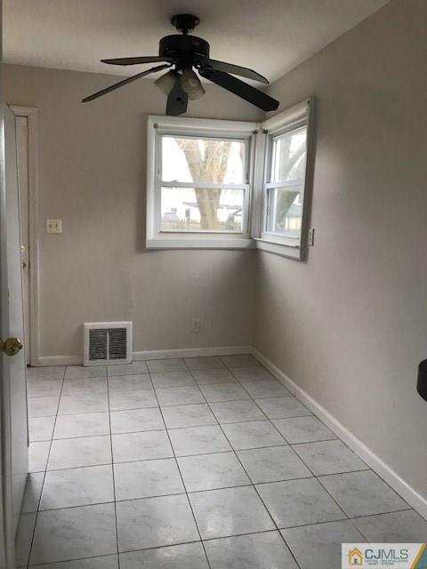 21 Kendall Road East Brunswick, NJ 08816 - Photo 8 of 21 a view of an empty room with a window