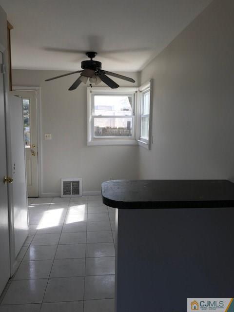 21 Kendall Road East Brunswick, NJ 08816 - Photo 9 of 21 a bathroom with a granite countertop sink a mirror and a shower
