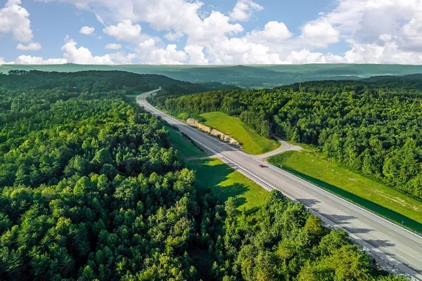 a view of a balcony with a park