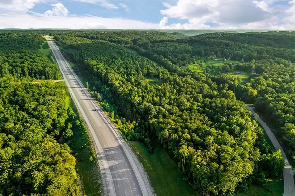 a view of a garden with a building