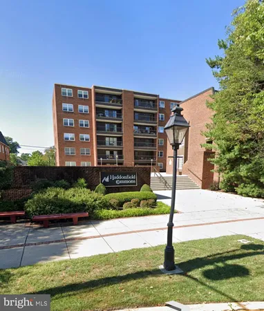 a view of building with yard