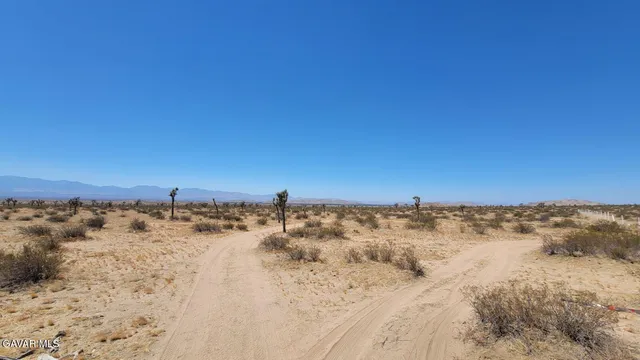 a view of ocean view with wooden fence