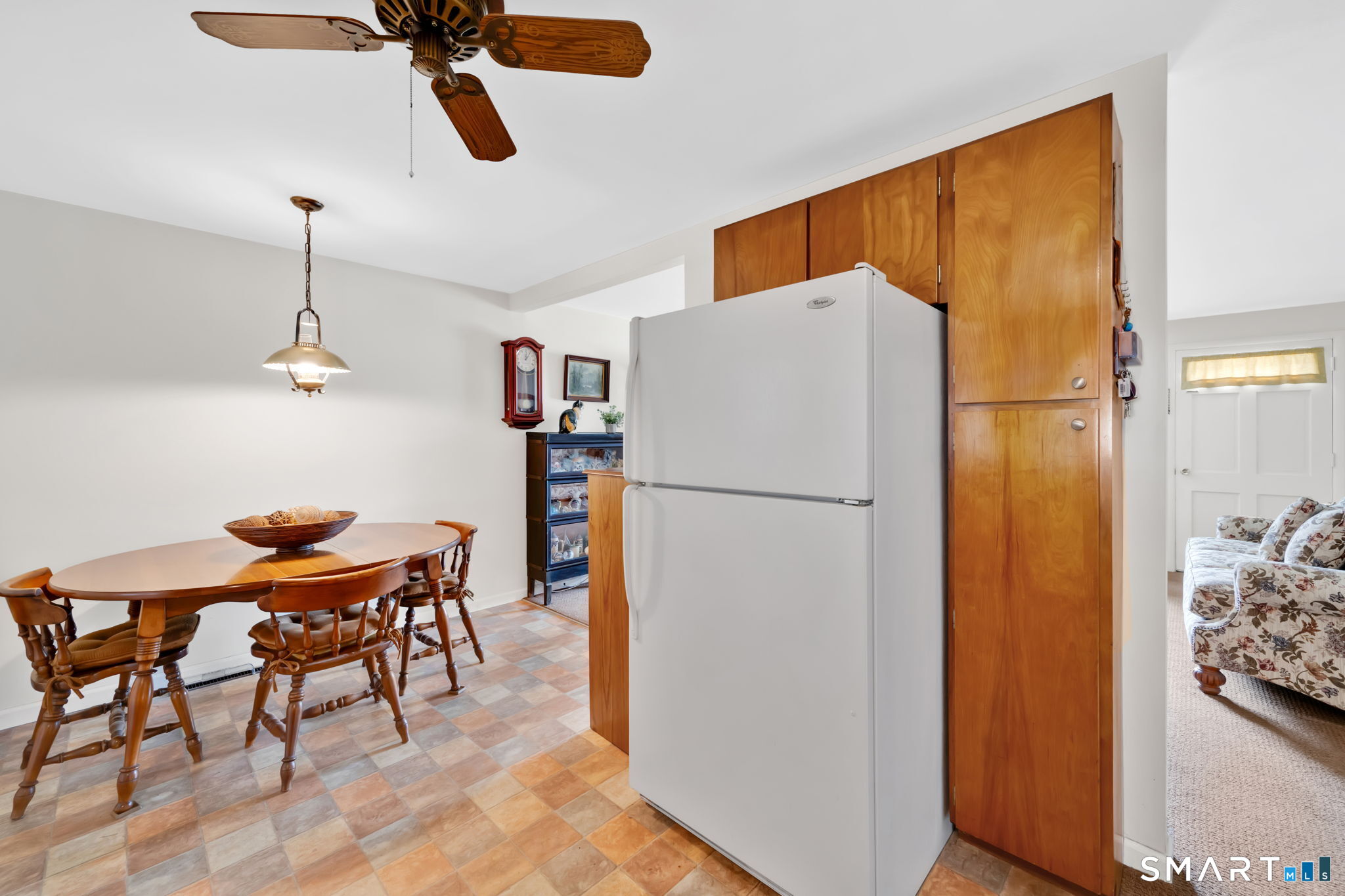 50 Carr Street Wallingford, CT 06492 - Photo 14 of 34 a white refrigerator freezer sitting in a kitchen