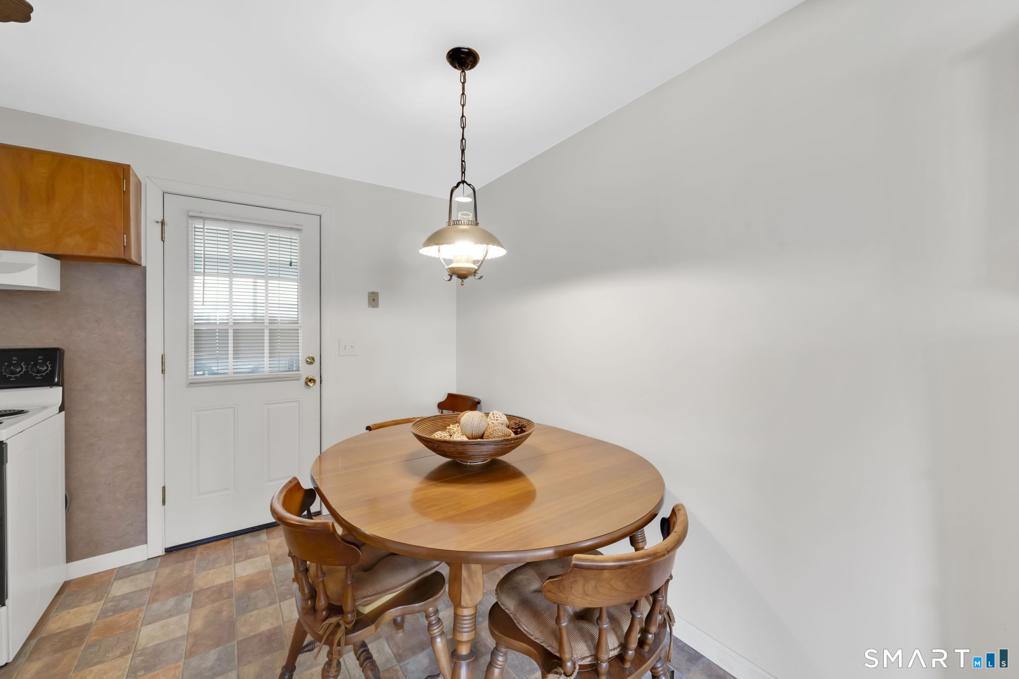 50 Carr Street Wallingford, CT 06492 - Photo 20 of 34 a view of a dining room with furniture and wooden floor